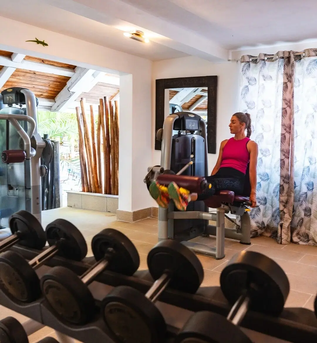 A woman sitting on a bench in a park