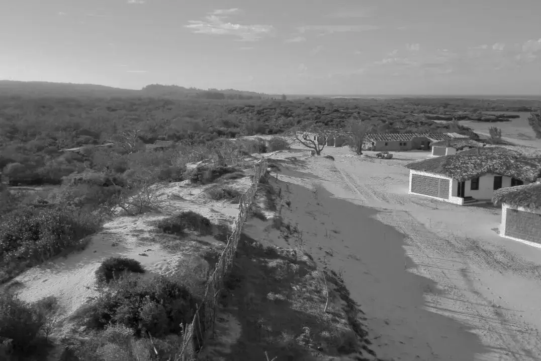 Aerial view of a desolate landscape with sandy paths