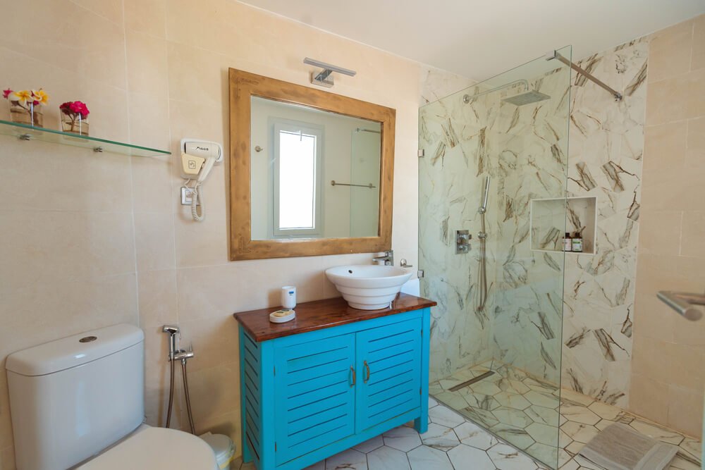 Modern bathroom featuring a glass shower