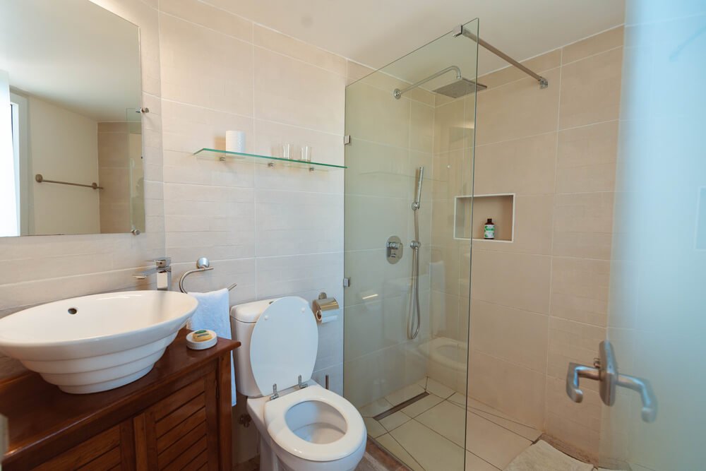 Modern bathroom with beige tiles